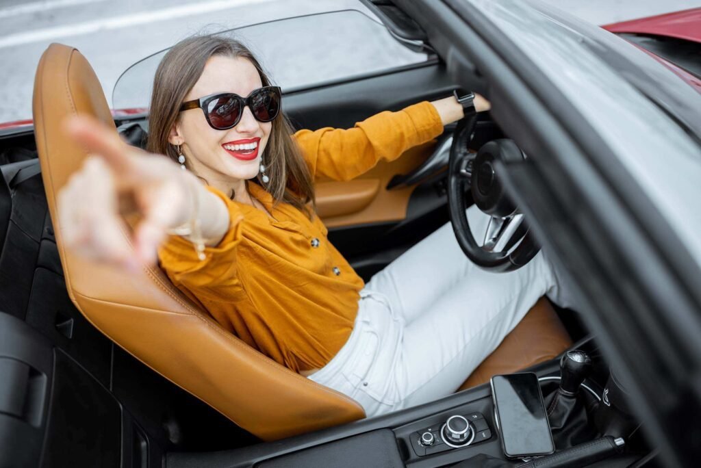 happy-woman-driving-a-car